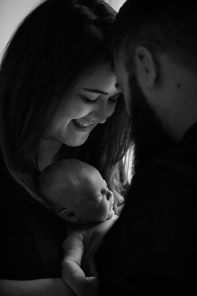 Farnham newborn baby and parents in photo studio
