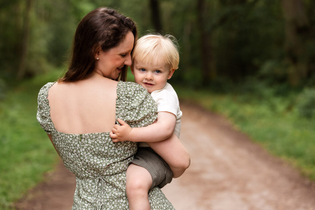 Mother and son photographed outdoors in Woking
