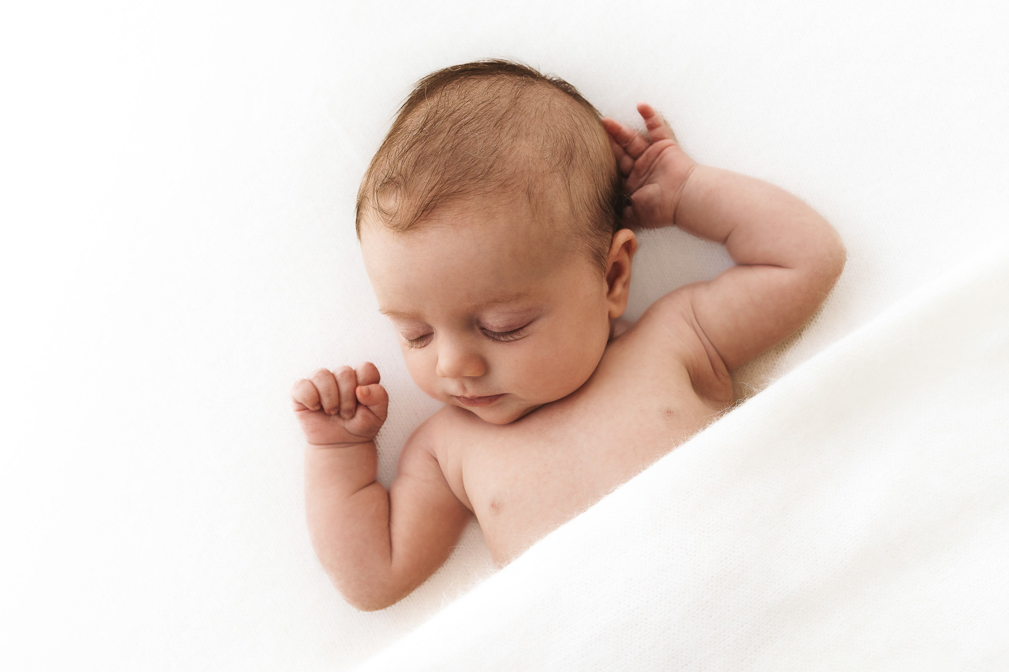 Sleeping baby photographed in Haslemere, Surrey