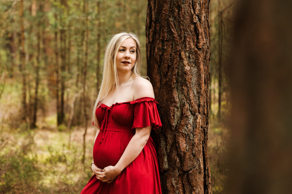 Pregnant lady in red dress photographed out in Woking