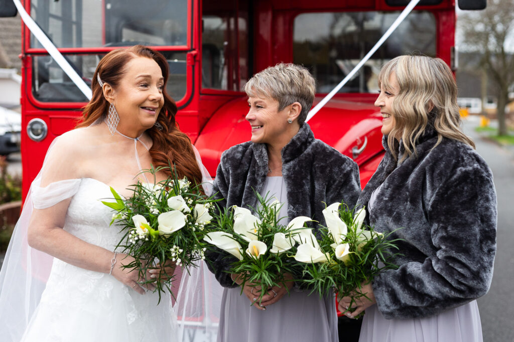 bride and bridesmaids outside in Godalming