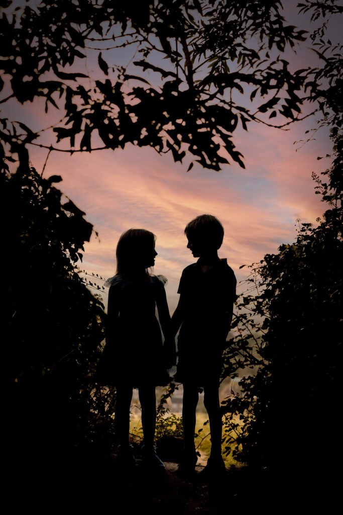 silhouette photo of children in Guildford